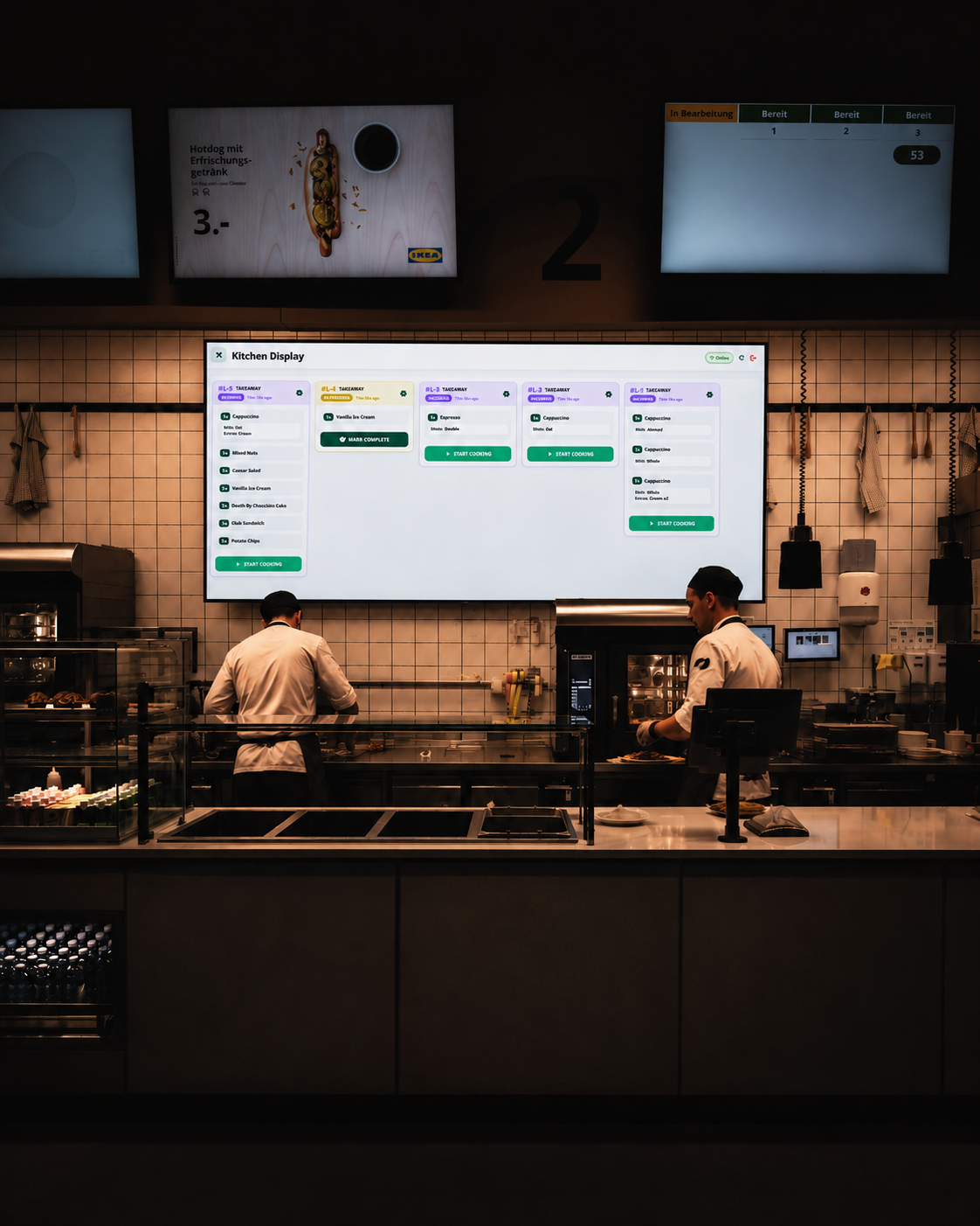 Kitchen display system showing live orders in a professional kitchen
