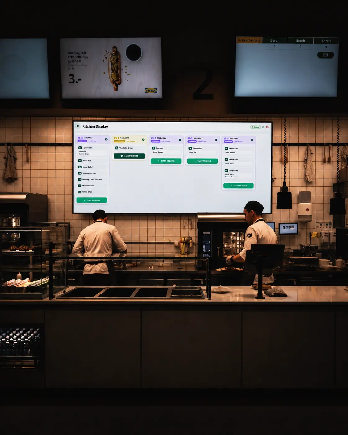 Kitchen display system showing live orders in a professional kitchen